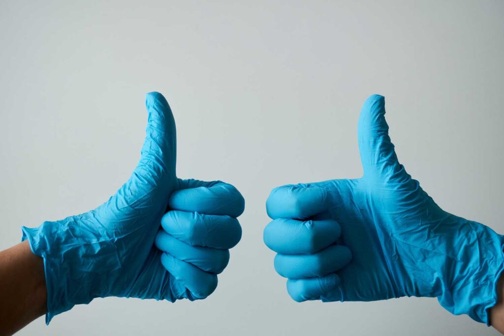 random doctor showing thumbs up