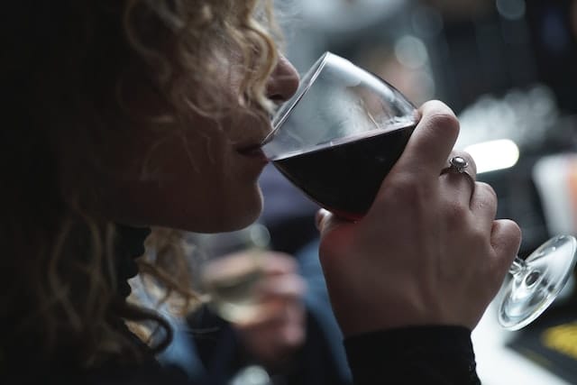 Person Drinking Red Wine